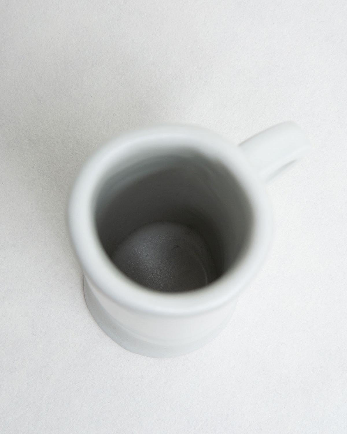 TALL SKINNY HANDLED VASE