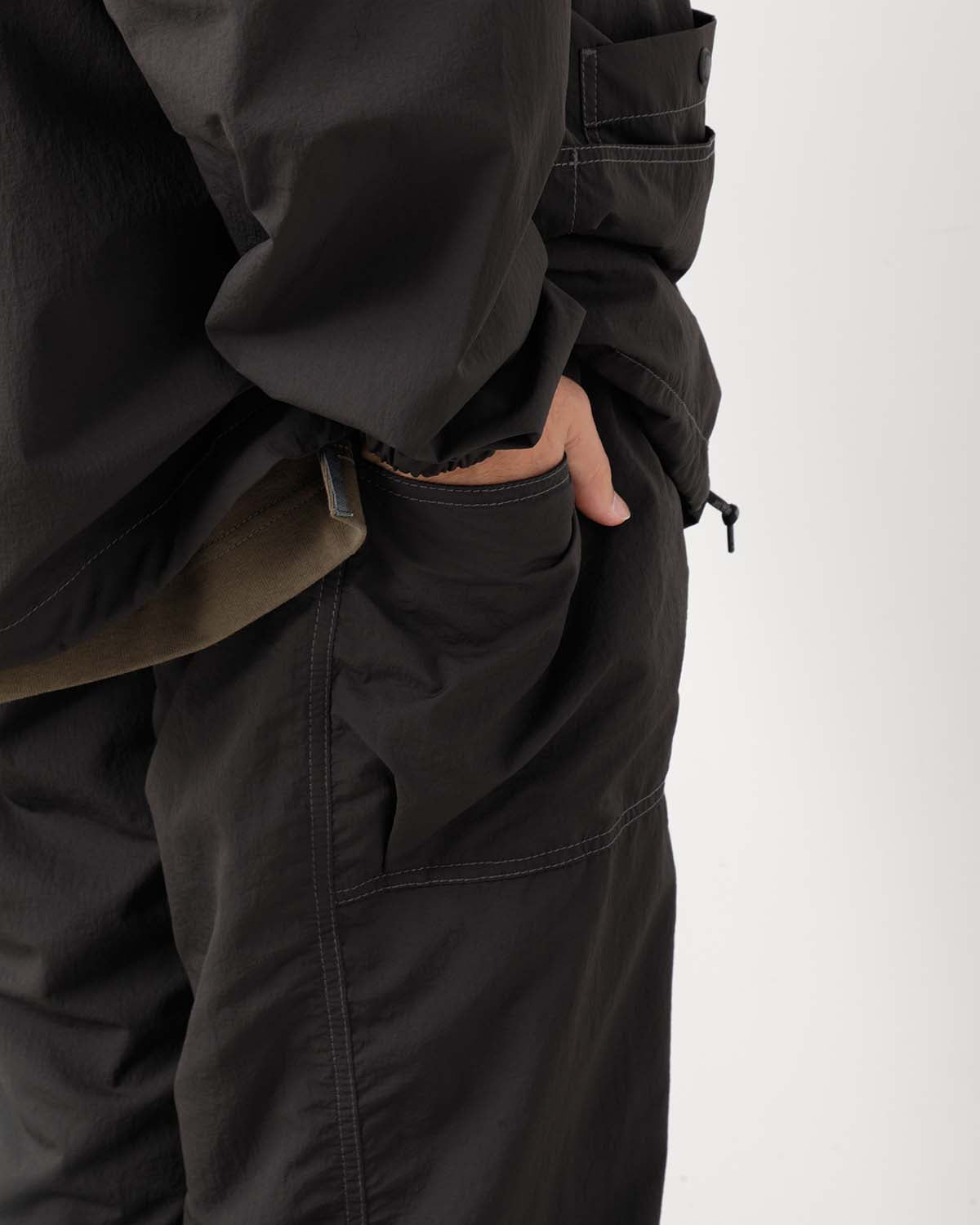 CRINKLED NYLON PANTS