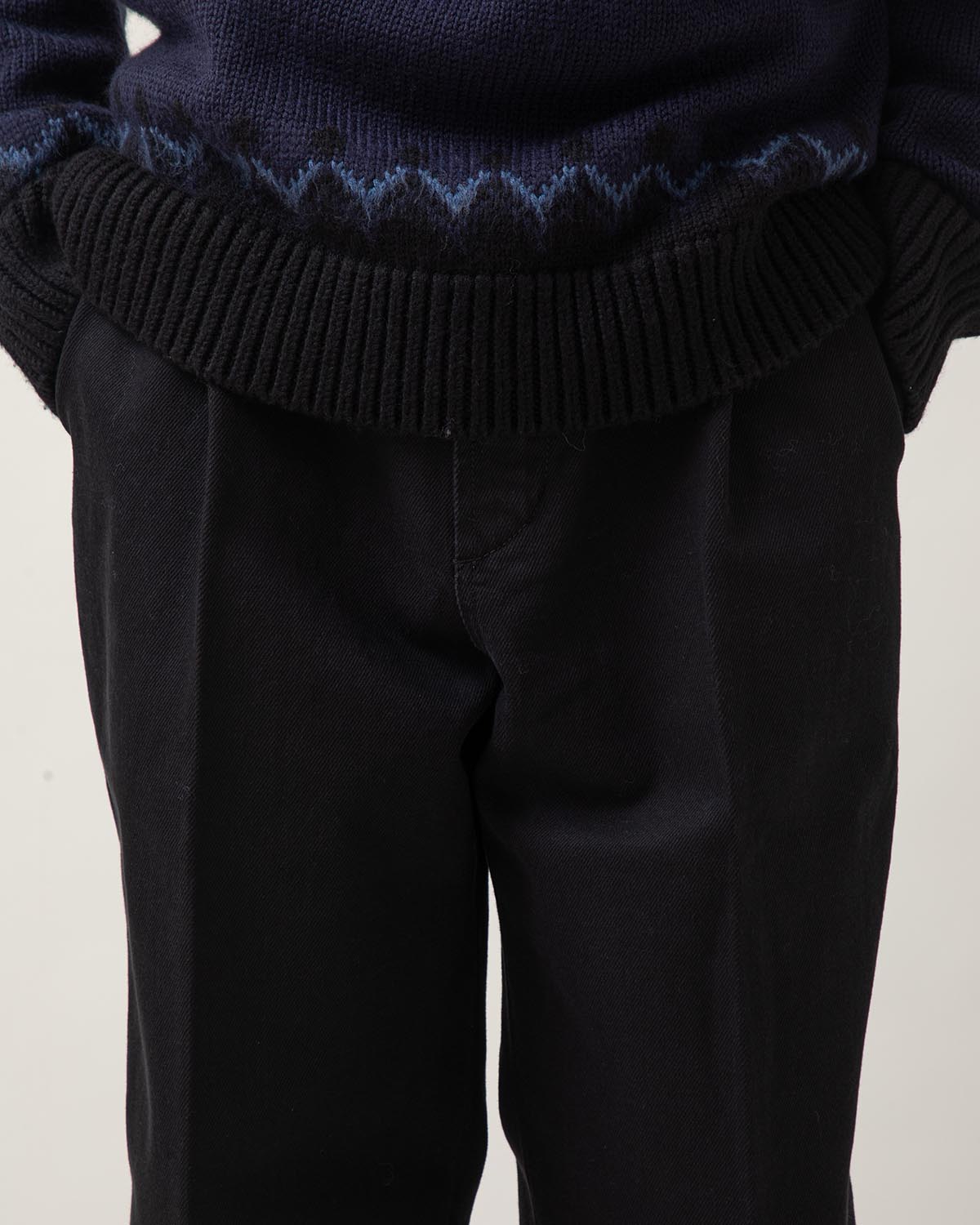 BLACK DENIM PLEATED TROUSERS