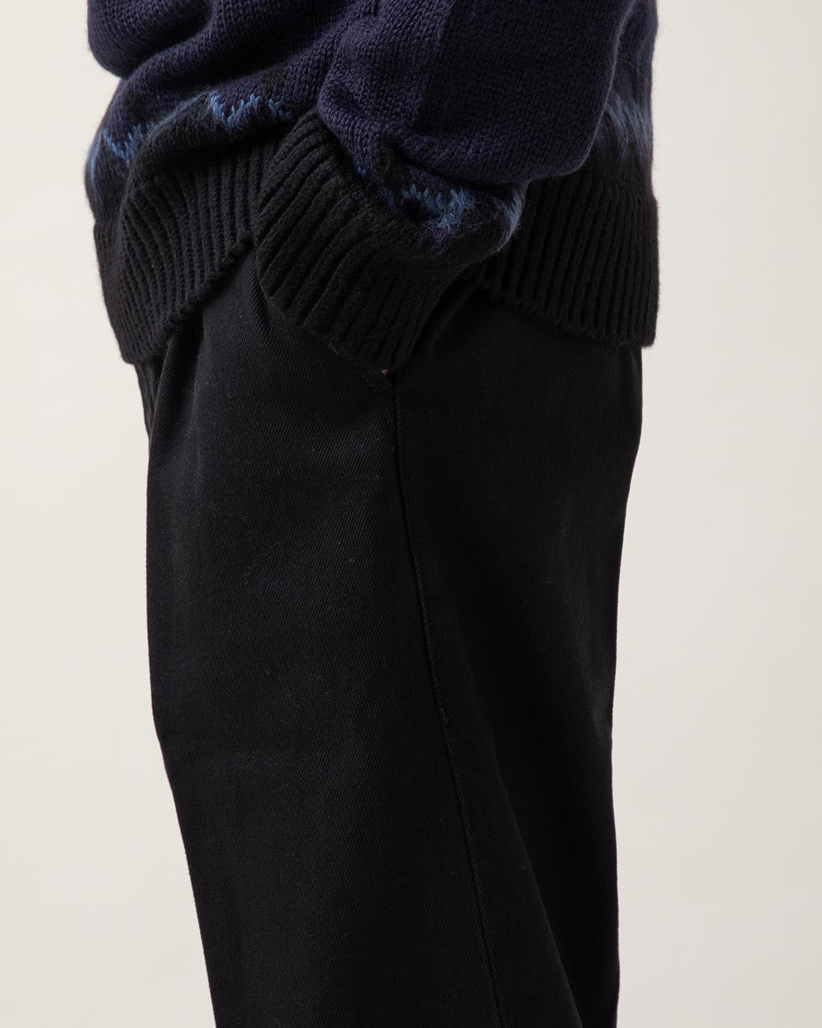 BLACK DENIM PLEATED TROUSERS