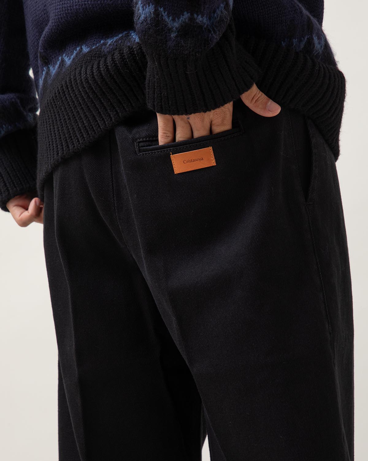 BLACK DENIM PLEATED TROUSERS