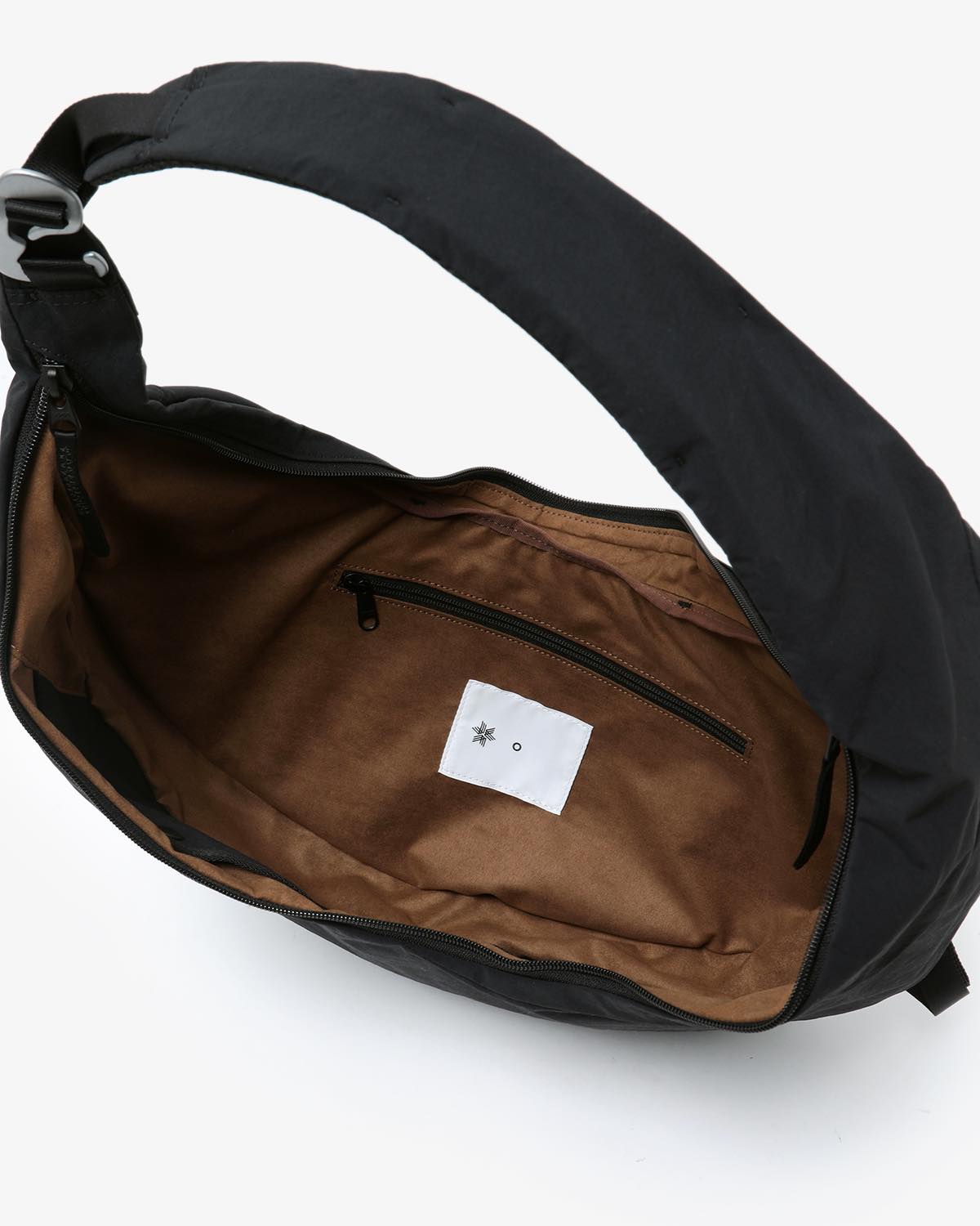 HELICOID ACROSS BODY BAG