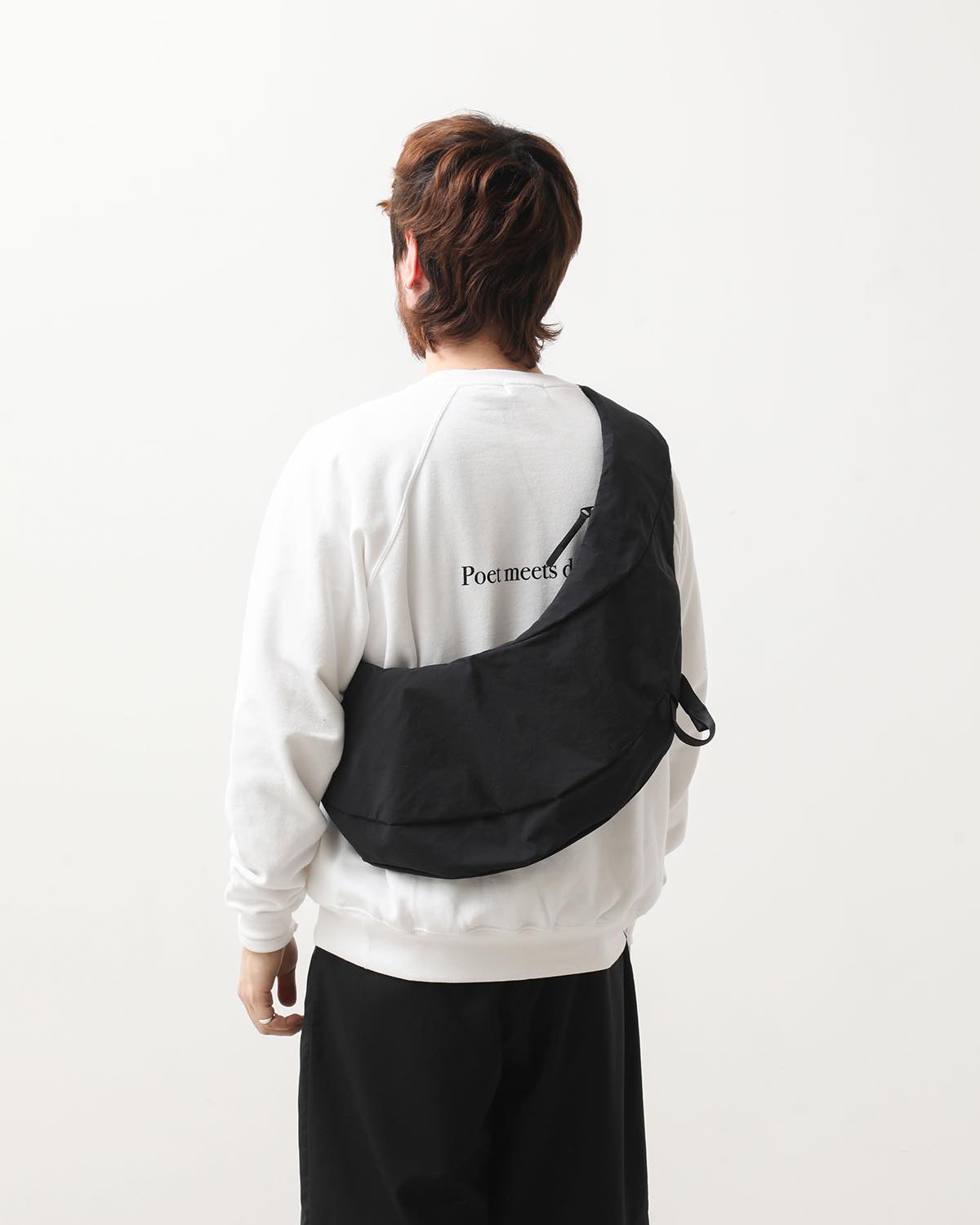 HELICOID ACROSS BODY BAG