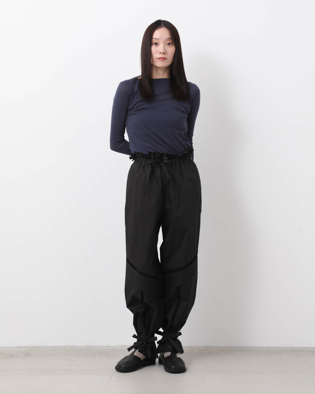 CUT RUFFLE TROUSERS