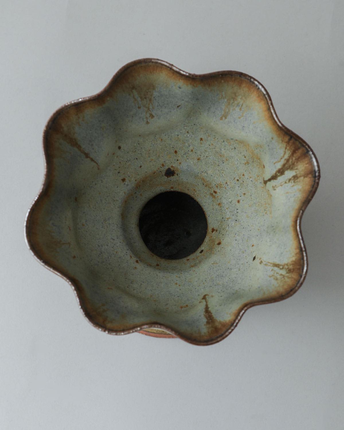 IRREGULAR FLOWER VASE IN LIGHT BLUE GLAZE