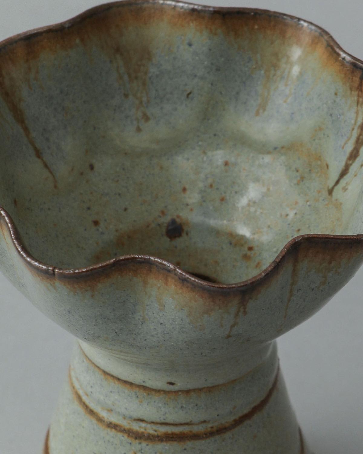 IRREGULAR FLOWER VASE IN LIGHT BLUE GLAZE