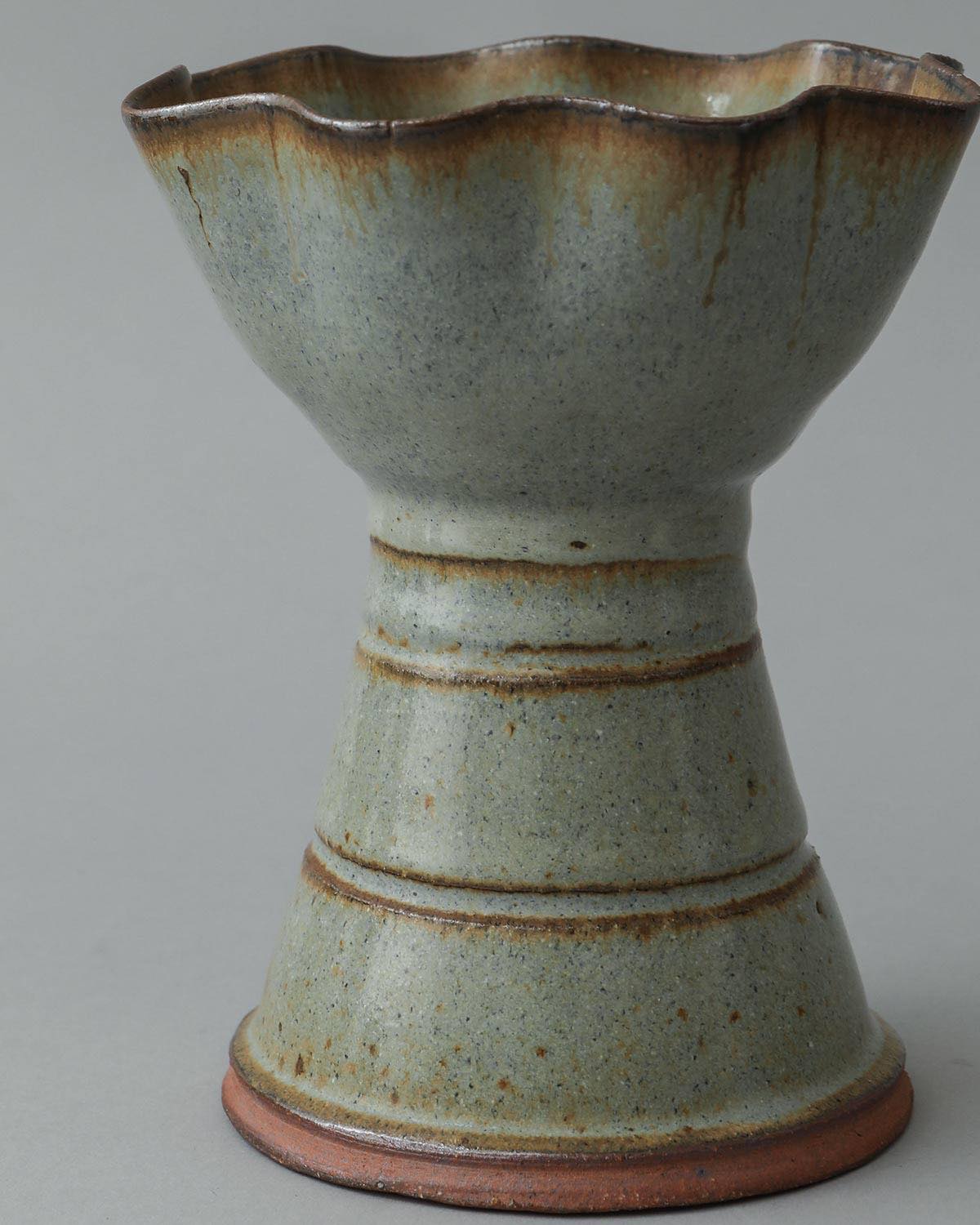 IRREGULAR FLOWER VASE IN LIGHT BLUE GLAZE