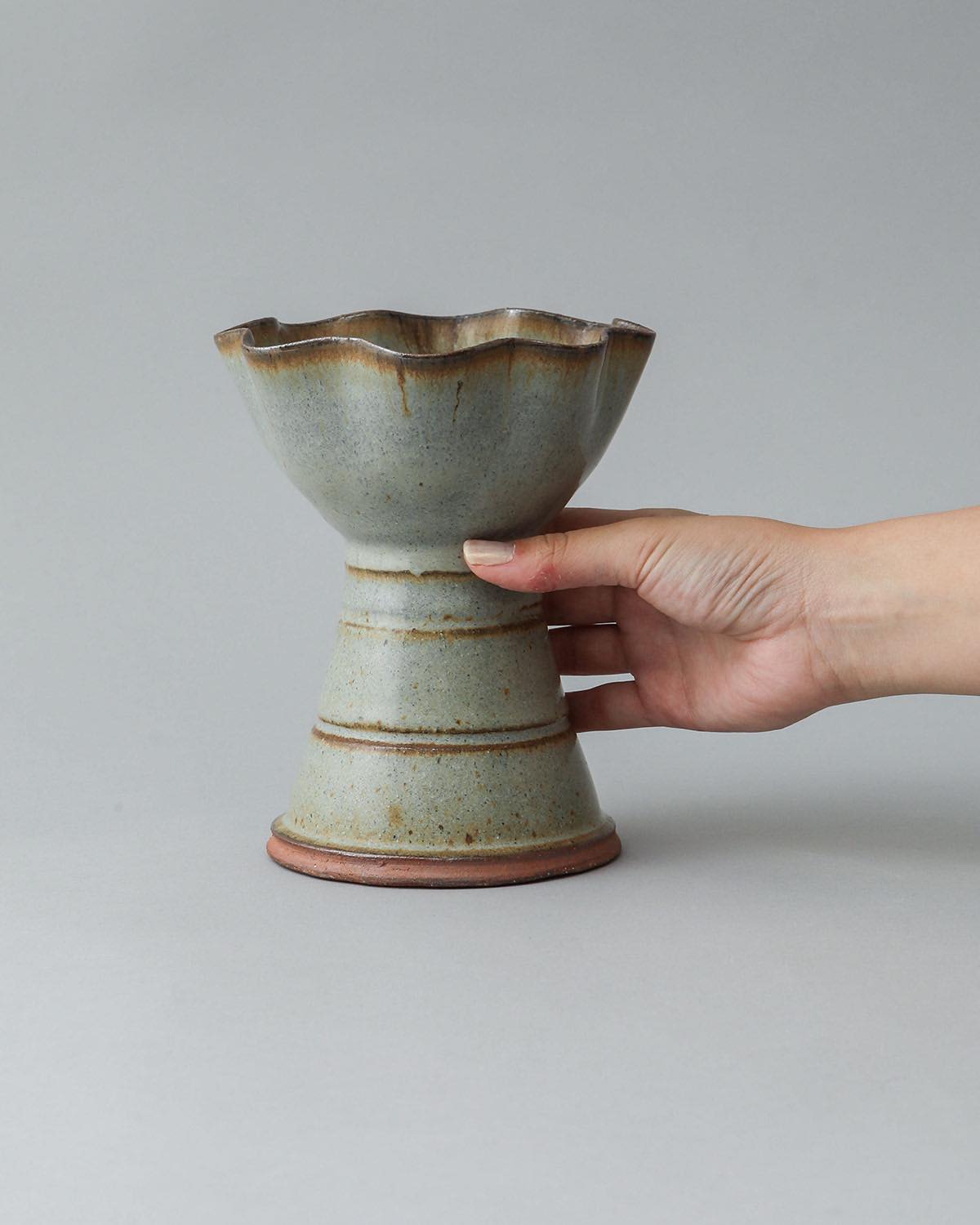 IRREGULAR FLOWER VASE IN LIGHT BLUE GLAZE