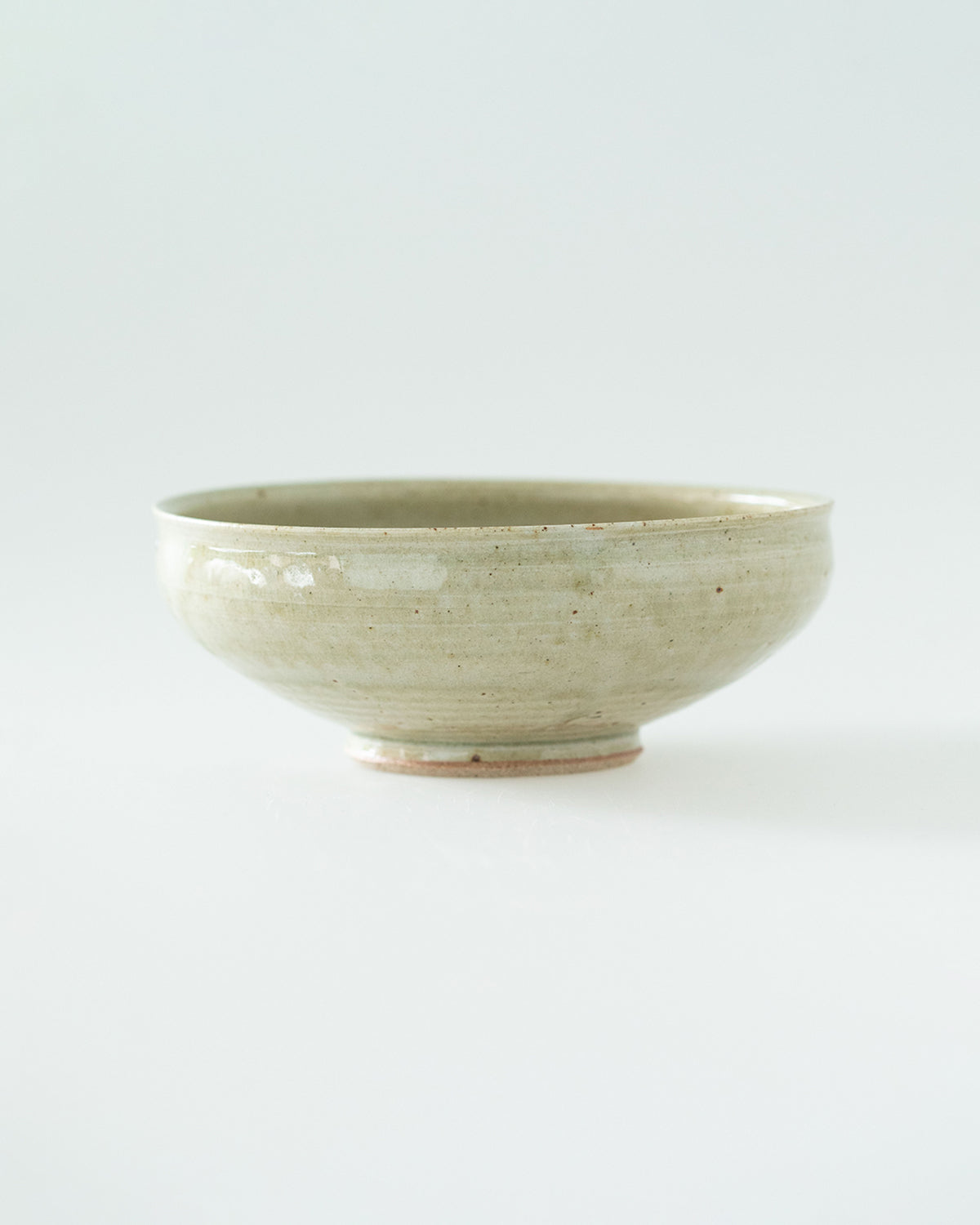 6-SUN ROUND BOWL - PALE GREEN GLAZE