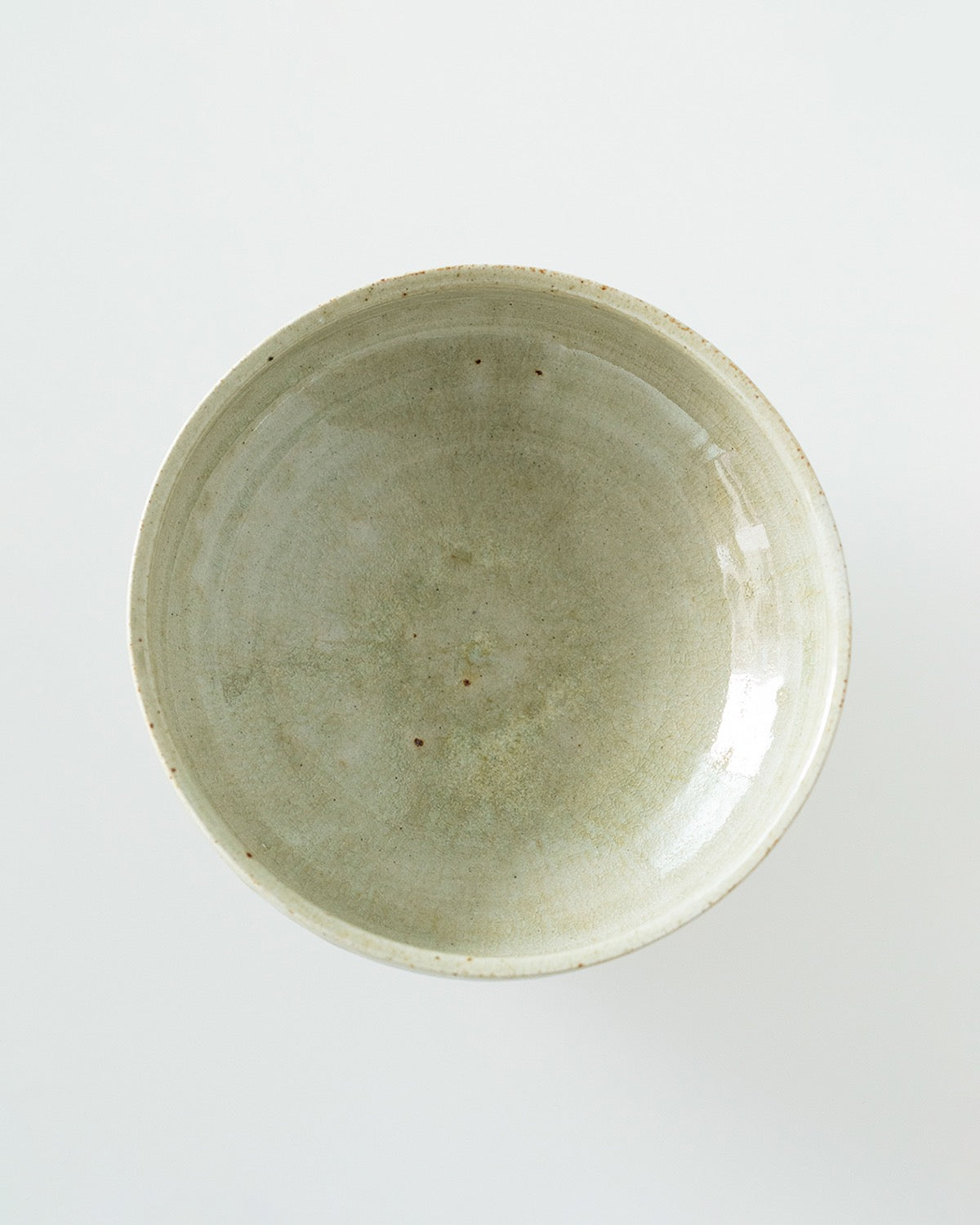 6-SUN ROUND BOWL - PALE GREEN GLAZE