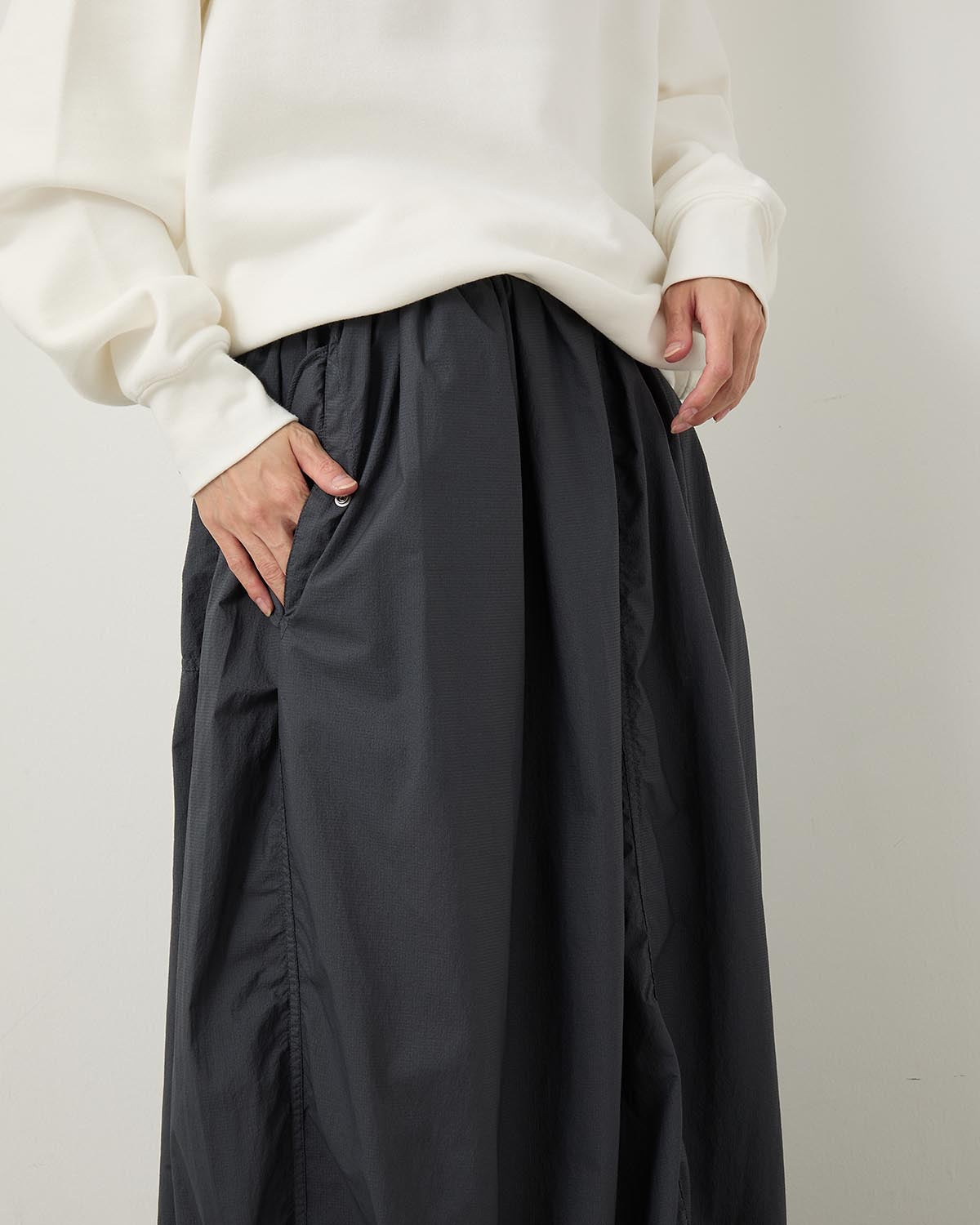 GARMENT DYED NYLON OVER SKIRT