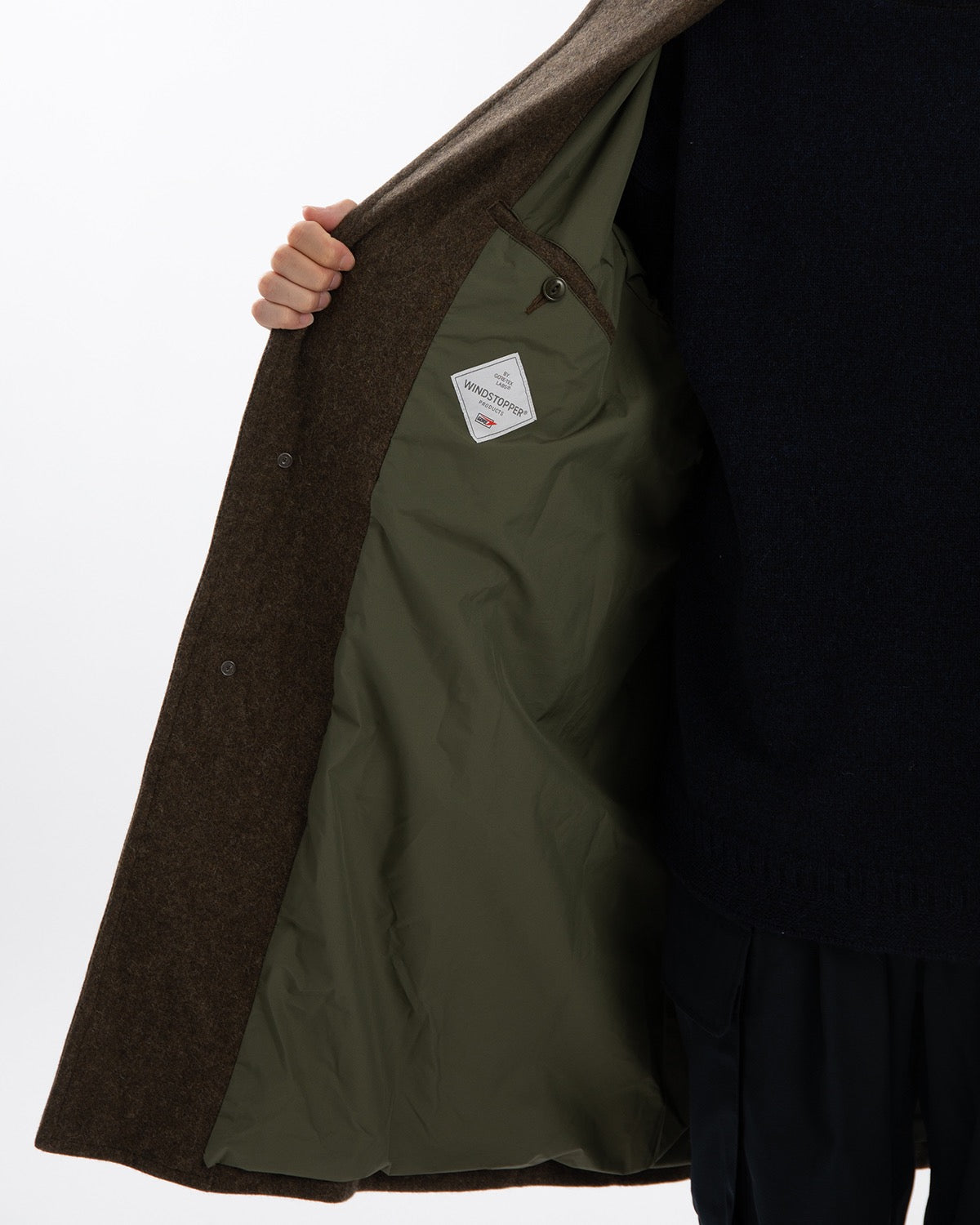 WANDERER LONG COAT WOOL NYLON MELTON OW WITH WINDSTOPPER®
