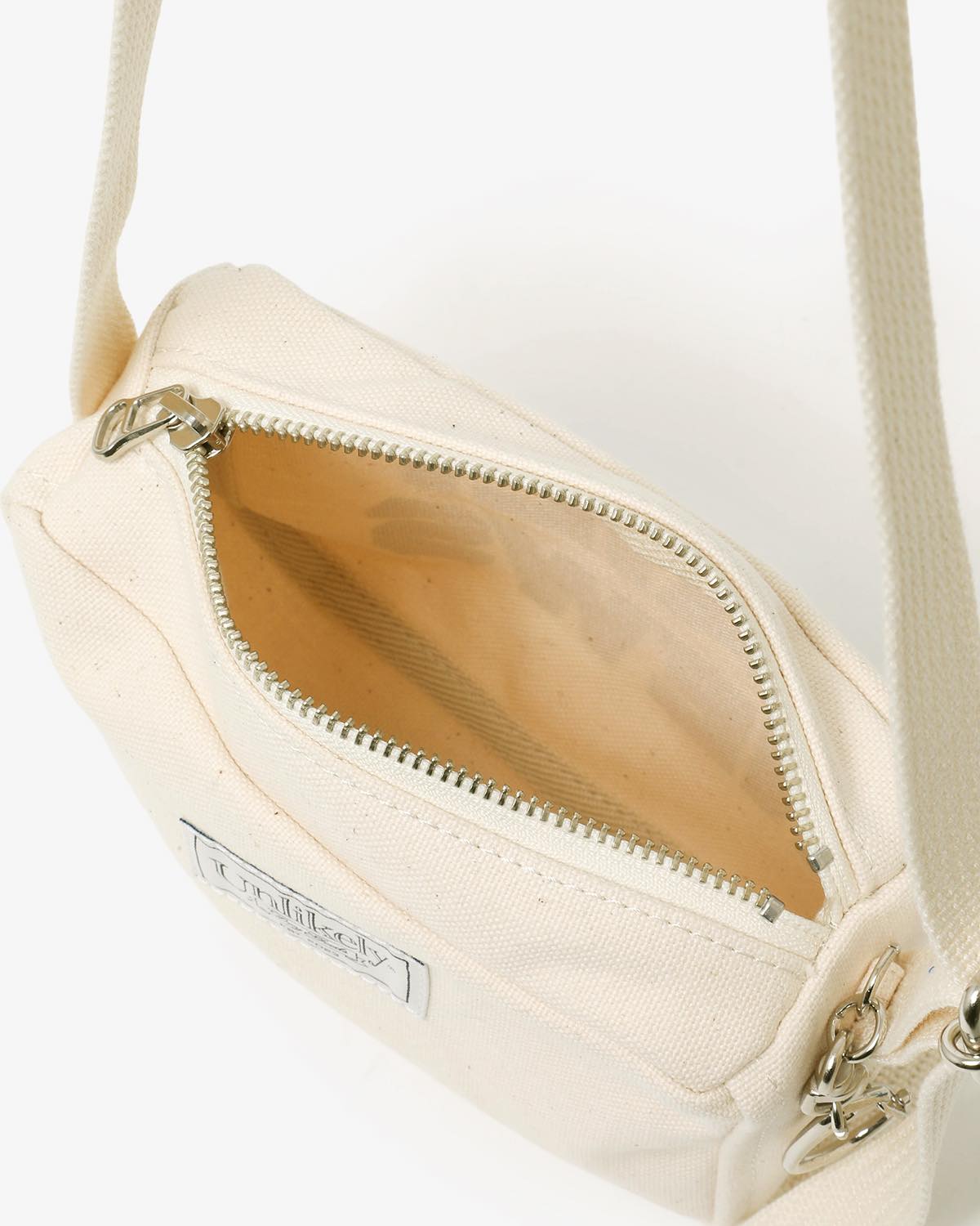 UNLIKELY "MINIATURE" MESSENGER BAG