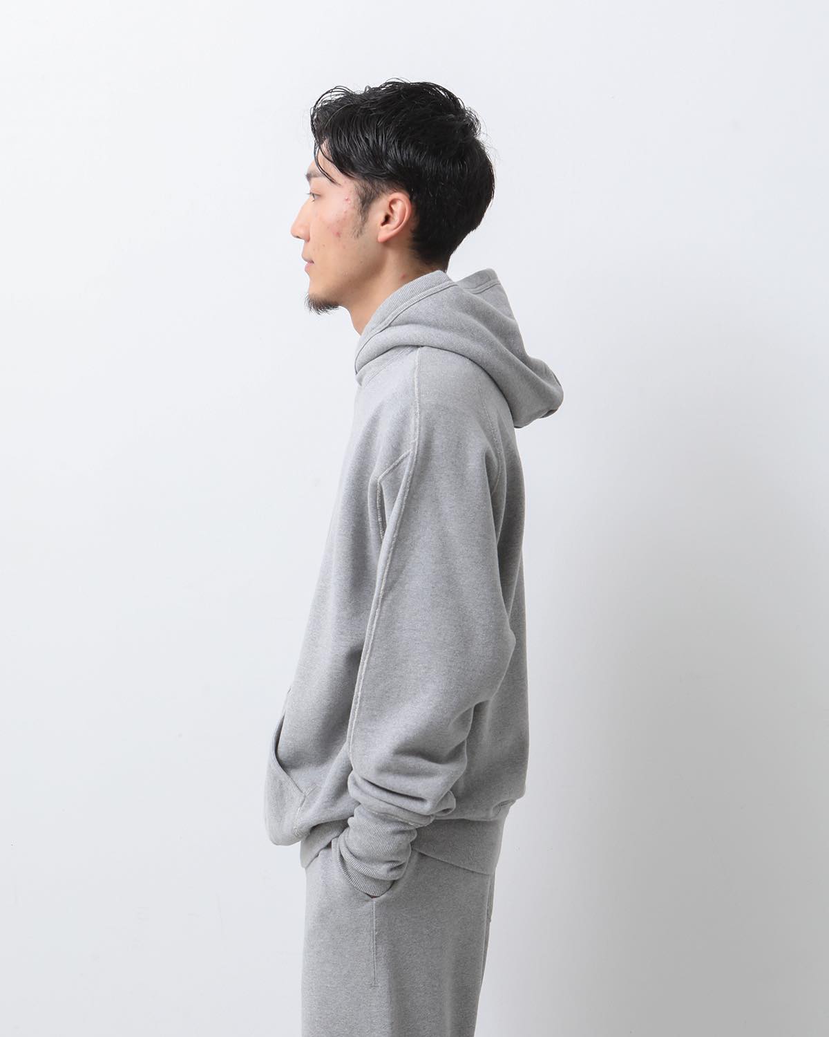 UNLIKELY SPLIT RAGLAN SLEEVE HOODIE