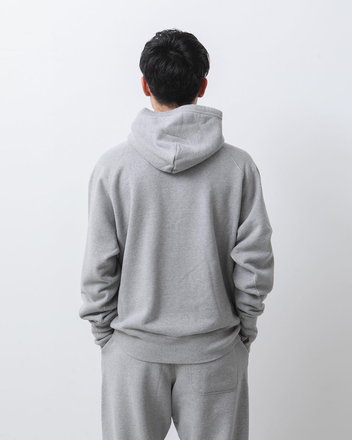 UNLIKELY SPLIT RAGLAN SLEEVE HOODIE