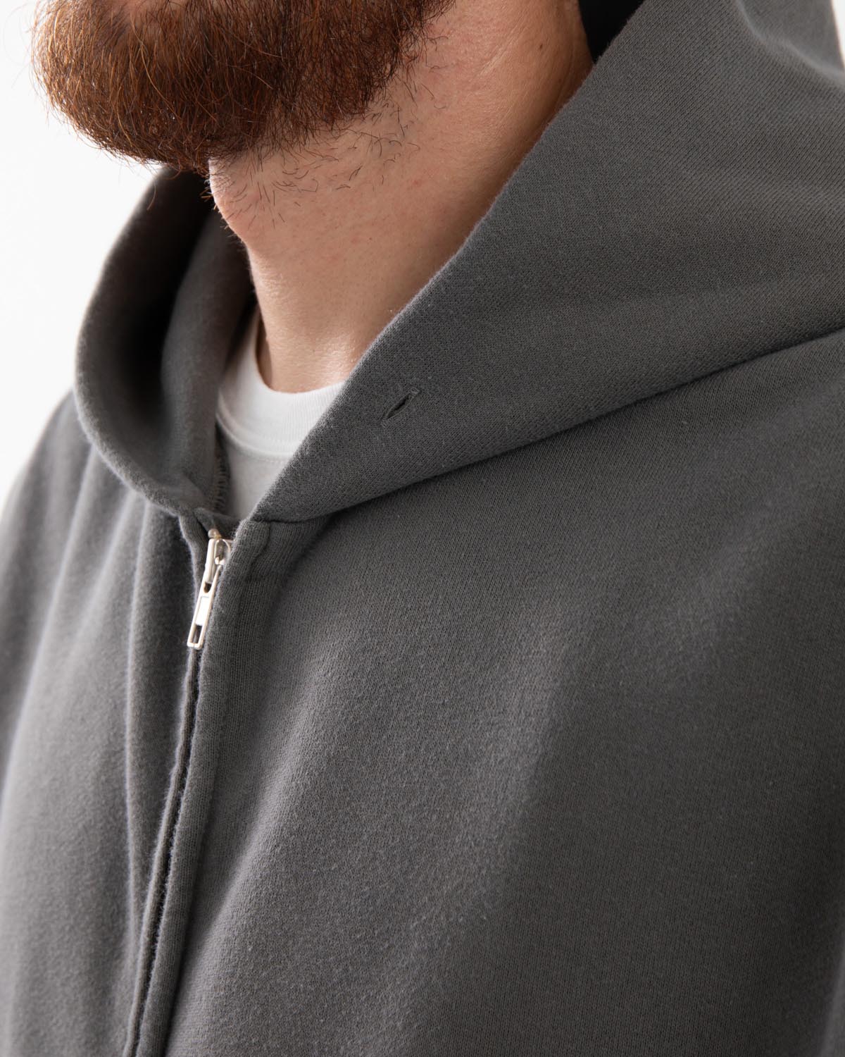 UNLIKELY ZIP HOODIE