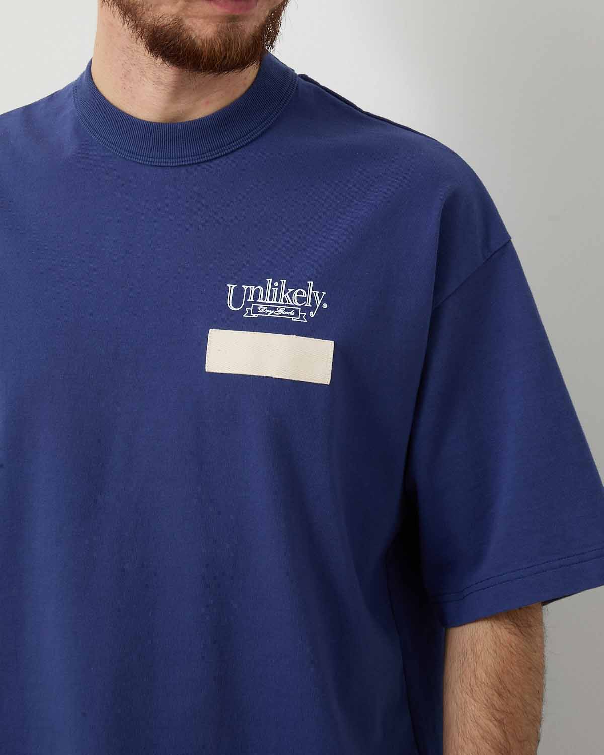 UNLIKELY TEAM TEE