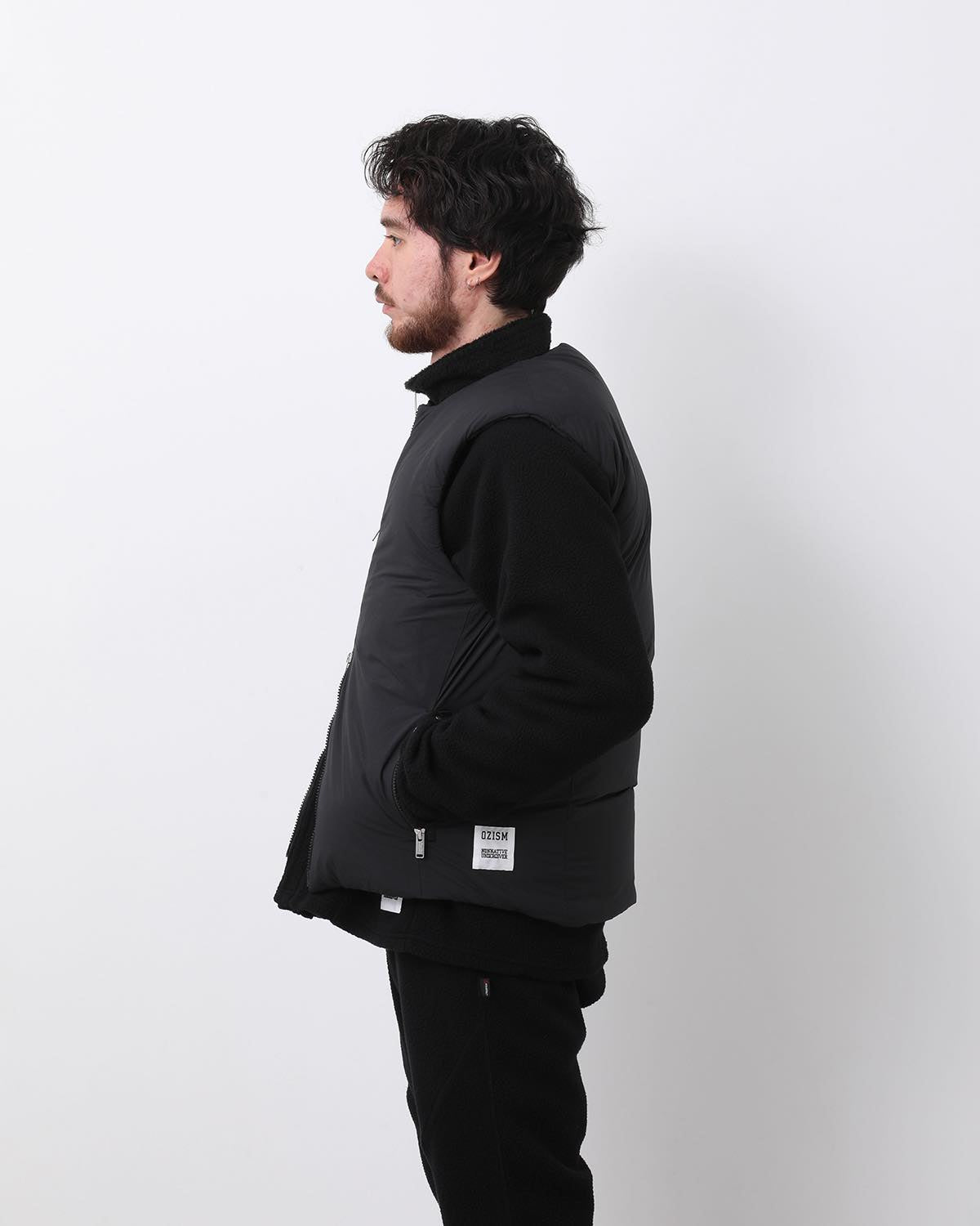 MONK DOWN VEST NYLON TYPEWRITER WITH WINDSTOPPER®