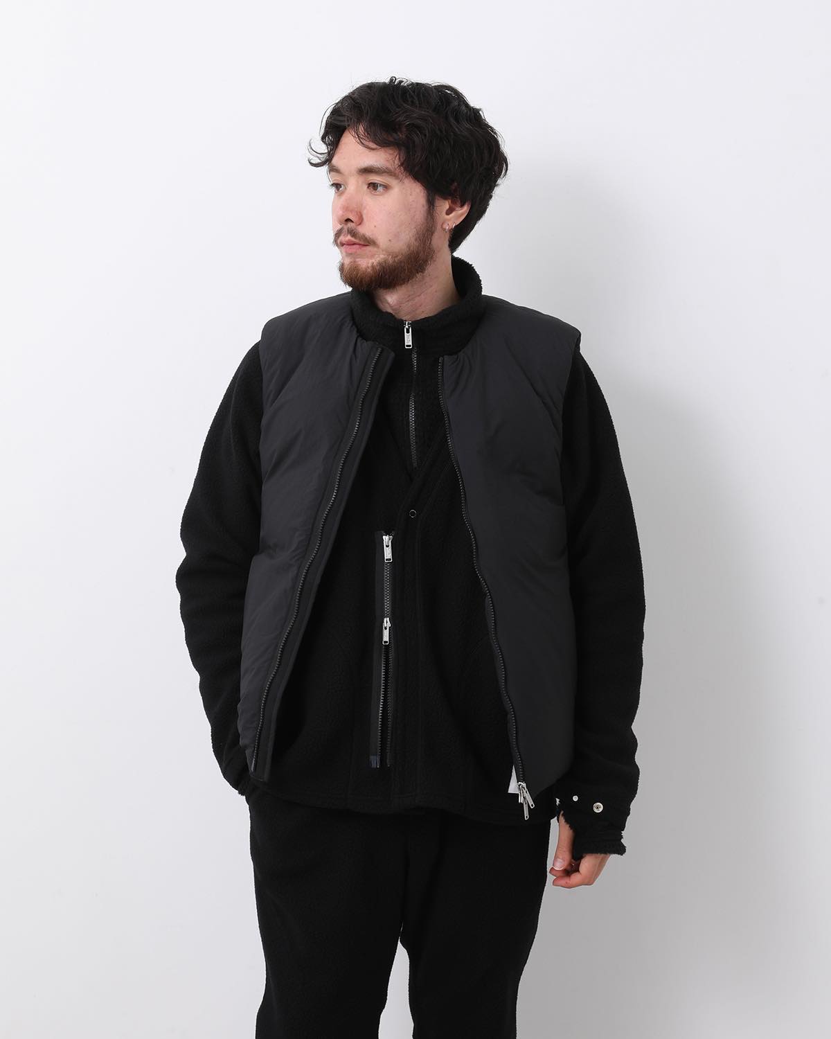 MONK DOWN VEST NYLON TYPEWRITER WITH WINDSTOPPER®