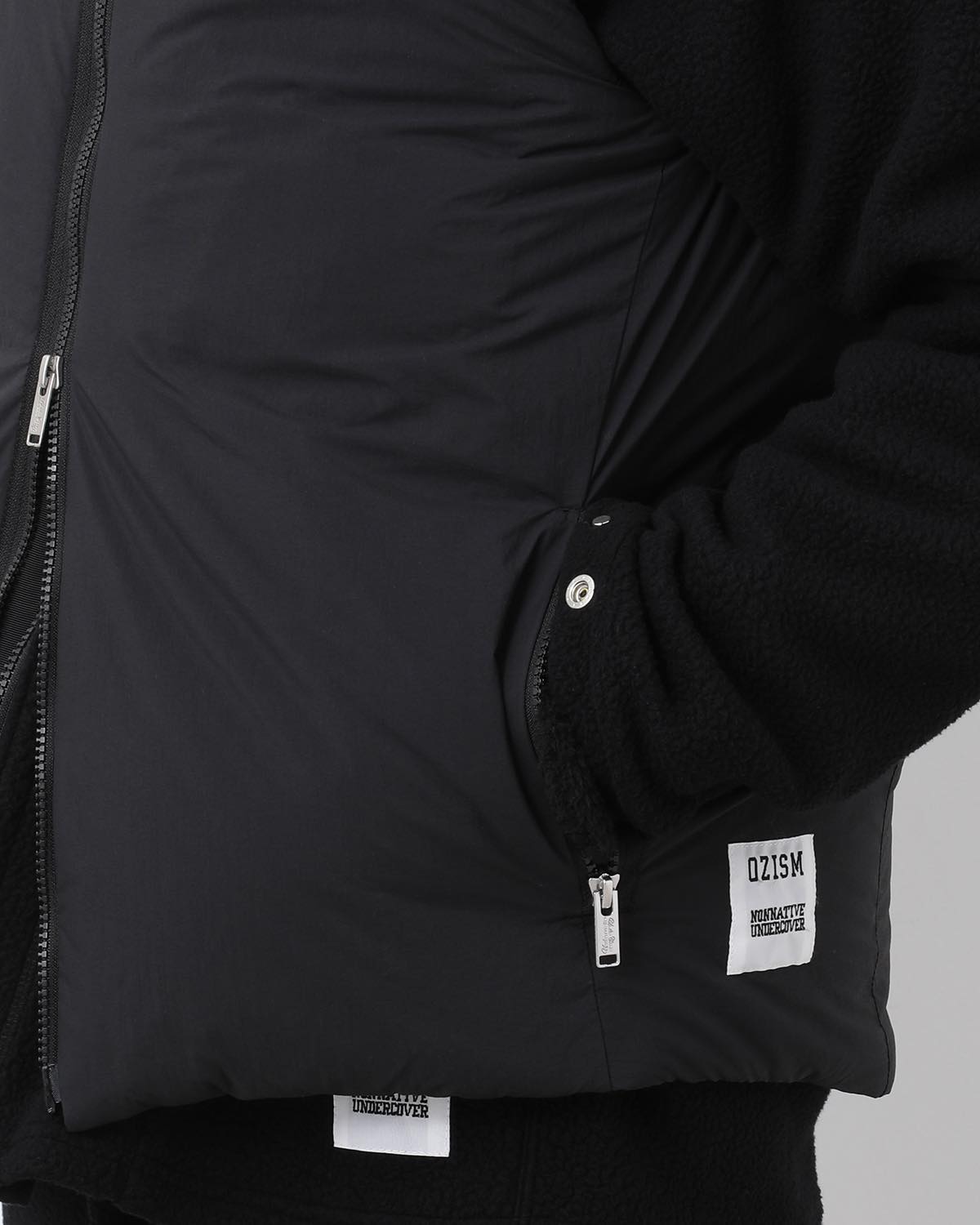 MONK DOWN VEST NYLON TYPEWRITER WITH WINDSTOPPER®