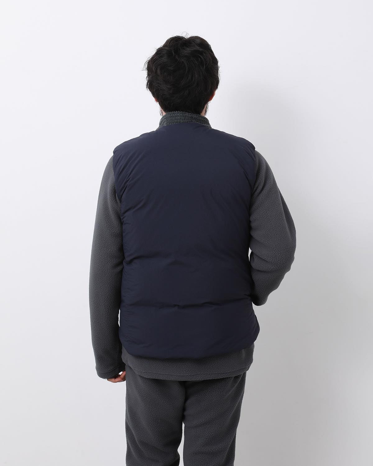 MONK DOWN VEST NYLON TYPEWRITER WITH WINDSTOPPER®