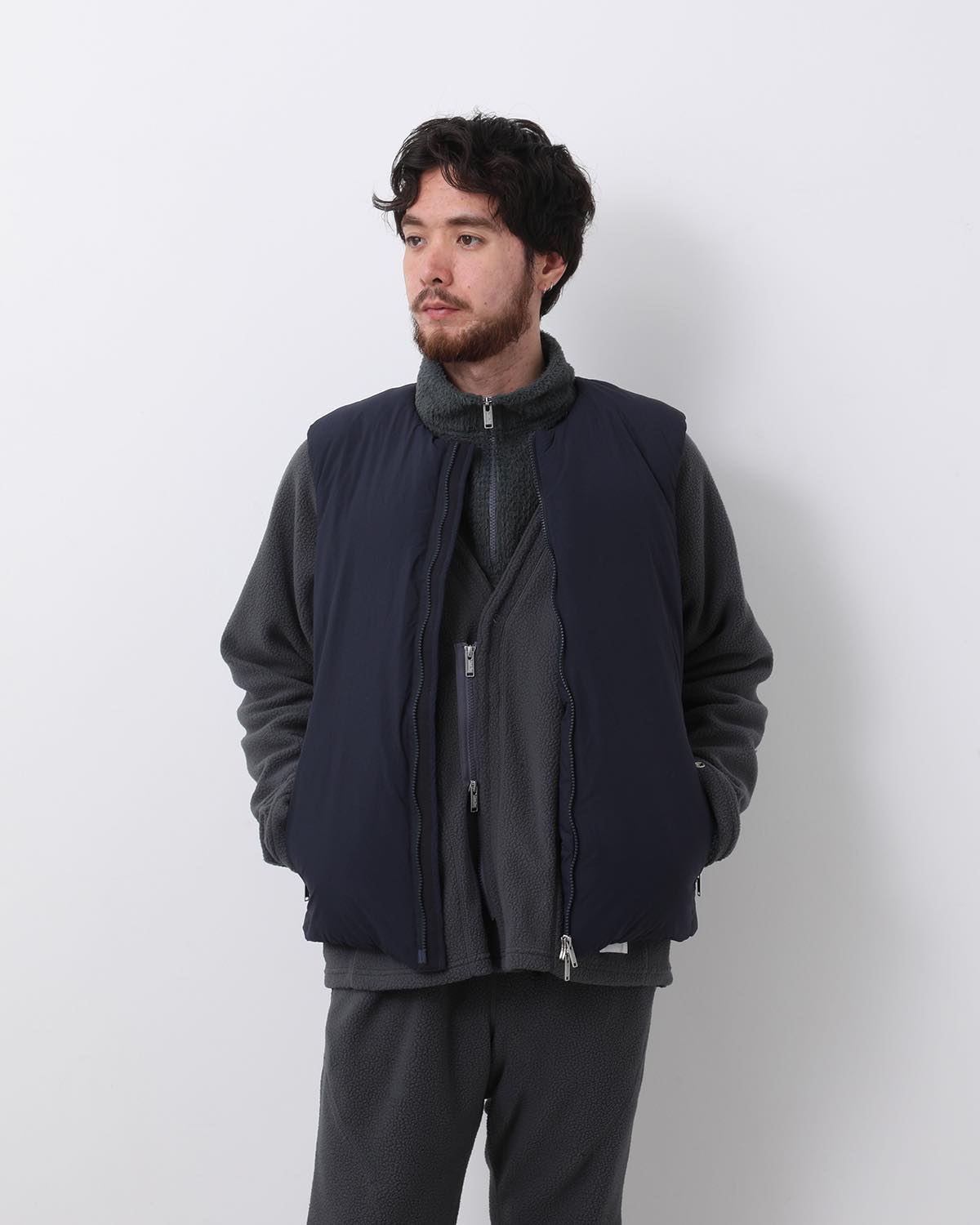 MONK DOWN VEST NYLON TYPEWRITER WITH WINDSTOPPER®