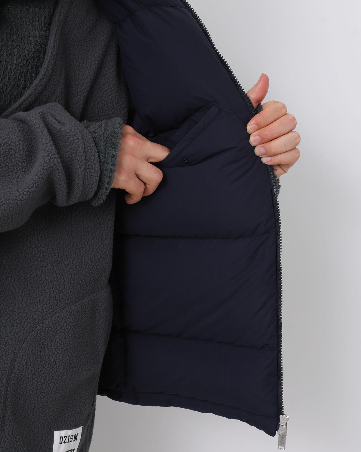 MONK DOWN VEST NYLON TYPEWRITER WITH WINDSTOPPER®